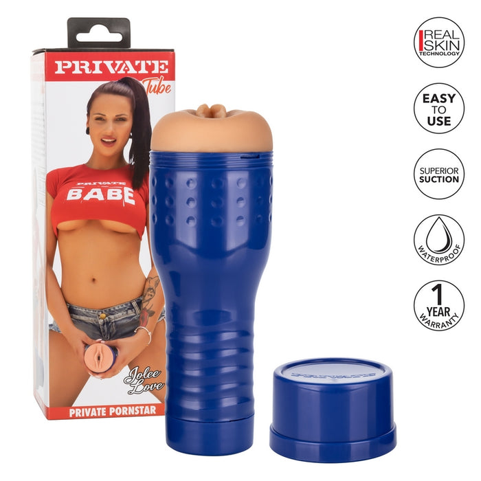 White and red packaging with a black haired Jolee Love posing on the front in a red crop top and blue jean shorts. Next to her is the beige masturbator with a vaginal opening, a hard blue shell and a twistable cap 