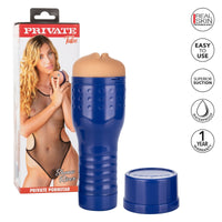 White and red packaging with a blonde Shona River posed on the front wearing a fishnet one piece. The beige masturbator with a mouth opening, a hard blue shell and a twistable cap beside her 