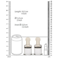 clear nipple xuction set next to diagram of lipstock and can for comparison