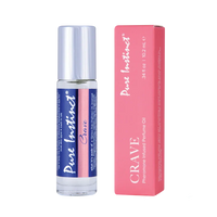 a bottle and box of pure instinct crave pheromone oil