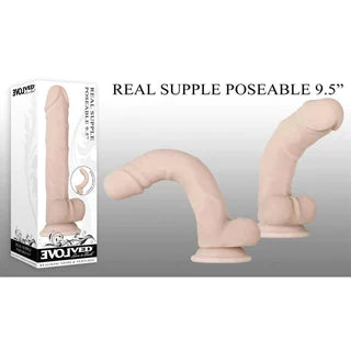 two rotated views of a beige detailed penis shaped dildo with balls and a suction cup. It is shown next to its white display box