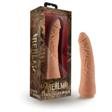 a beige penis shaped dildo shown next to its brown display box