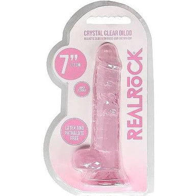 a pink detailed penis shaped dildo with balls and a suction cup. Shown in its plastic packaging.
