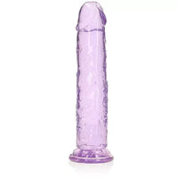 a purple translucent penis shaped dildo with a suction cup base