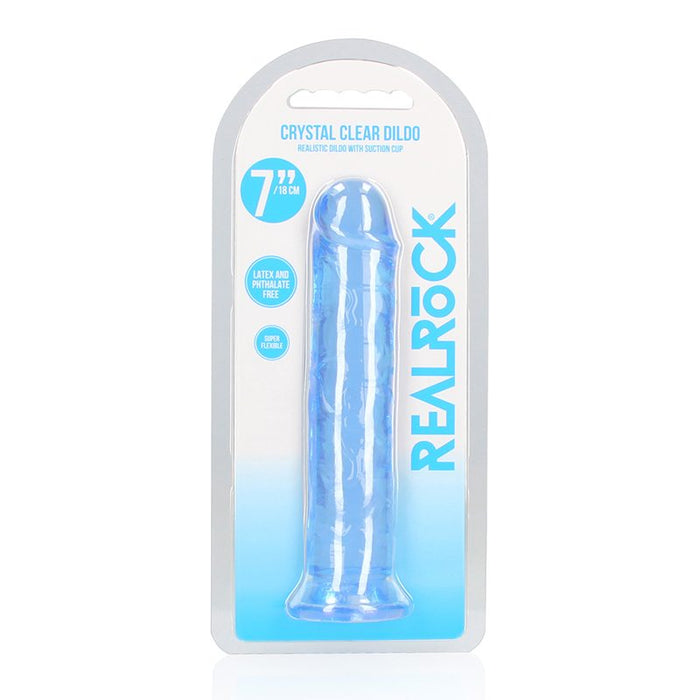 Crystal clear dildo in packaging with 'Real Rock' branding on a white background