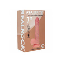 RealRock 7-inch dildo packaging box in a warm peach-brown color, featuring a photo of the pink silicone dildo on the front and white branding text.