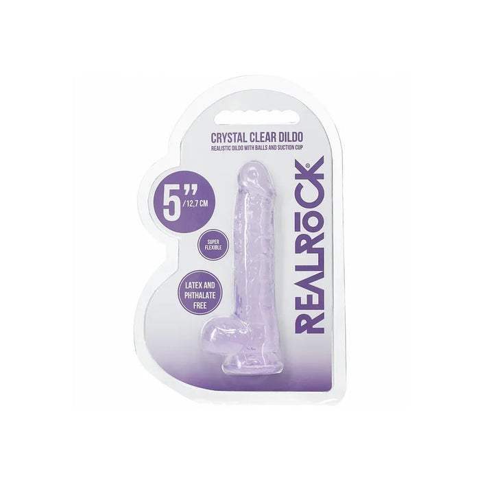 Crystal clear dildo packaging with 'Real Rock' branding on a white background