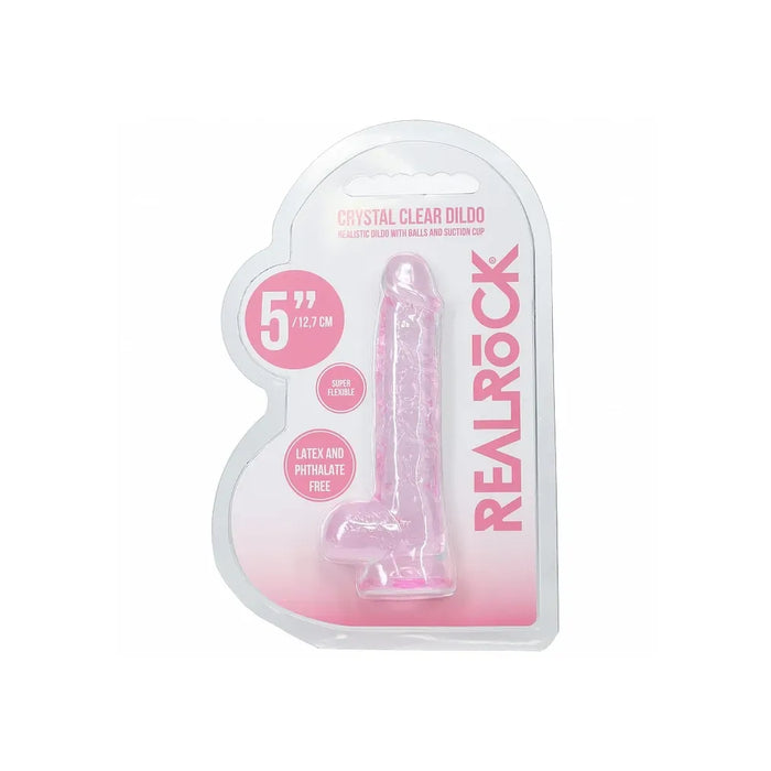 Clear plastic packaging with a pink dildo inside, labeled 'Real Rock'.