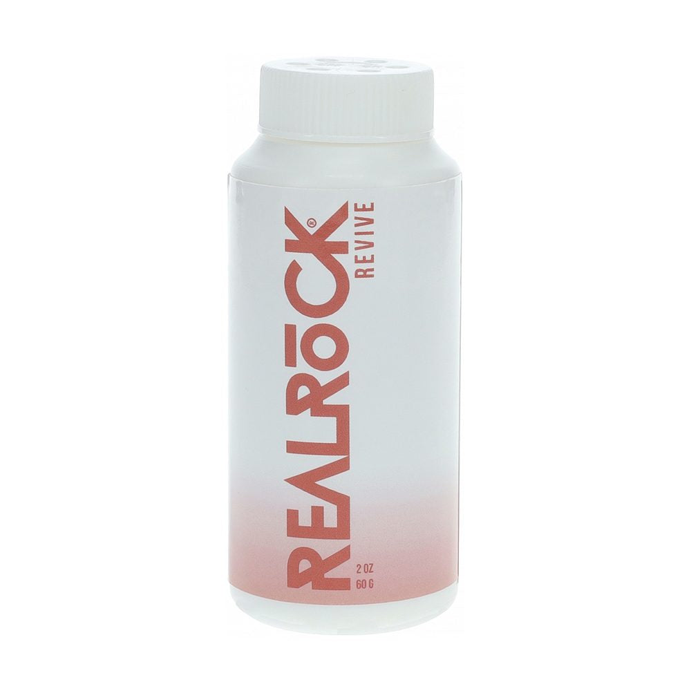 bottle of realrock revive powder 2oz on white back ground