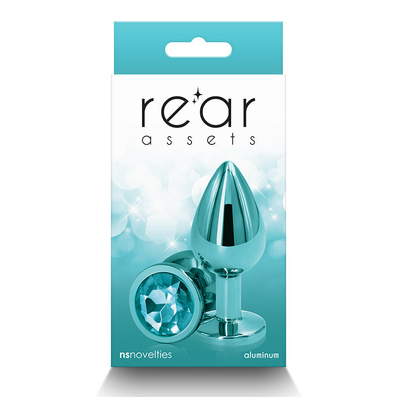 The product image shows a turquoise and silver anal plug in its packaging, with the brand 'Rear Assets' displayed. The plug has a smooth, chrome-plated finish and a tapered shape for easy insertion.