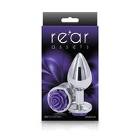 The product image shows a shiny, silver-colored anal plug with a rose-shaped base, presented in a package with a purple and black design.