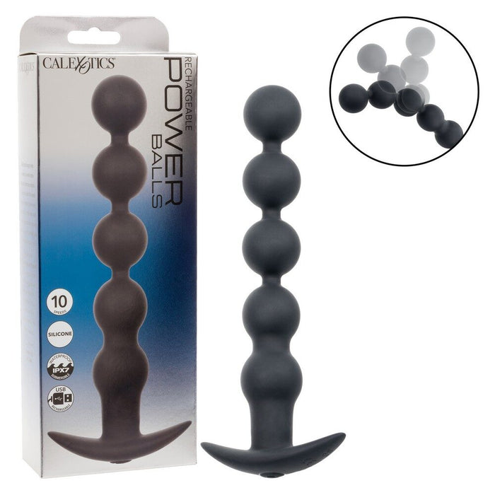 Black power balls with packaging and close-up inset on a white background