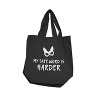 Black tote bag with white text and graphic on a white background My Safe Word Is Harder