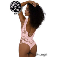 female wearing rhinestone net teddy. back view in pink