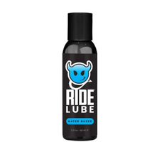Ride Lube bottle with black cap and blue logo on a white background