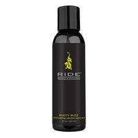 The product comes in a black bottle with a black cap. The black label has grey and yellow lettering and a yellow dragon.