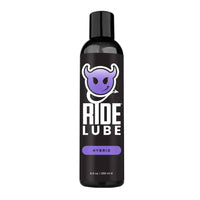 Ride Lube hybrid bottle with black and purple design on a white background