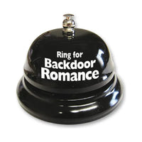 A black novelty bell with the phrase 'Ring for Backdoor Romance' printed in white on the top.