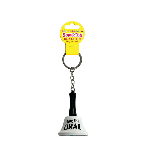 keychain bell white and black with ring for oral written on 