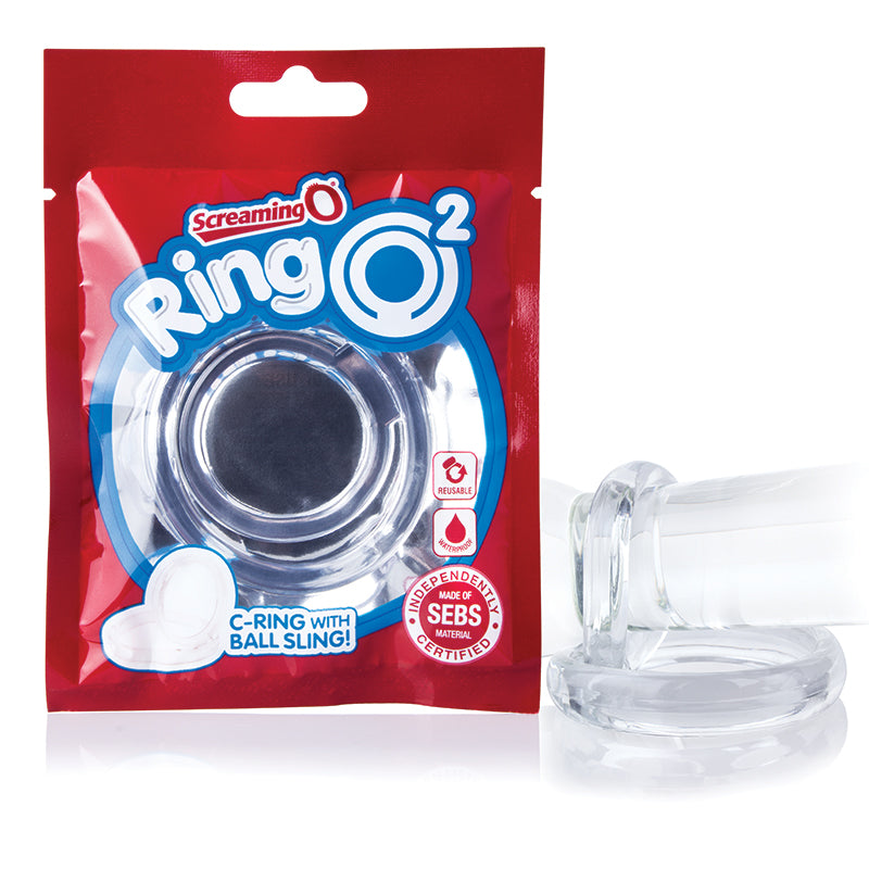 clear jelly cock ring with ball sling next to screaming o package