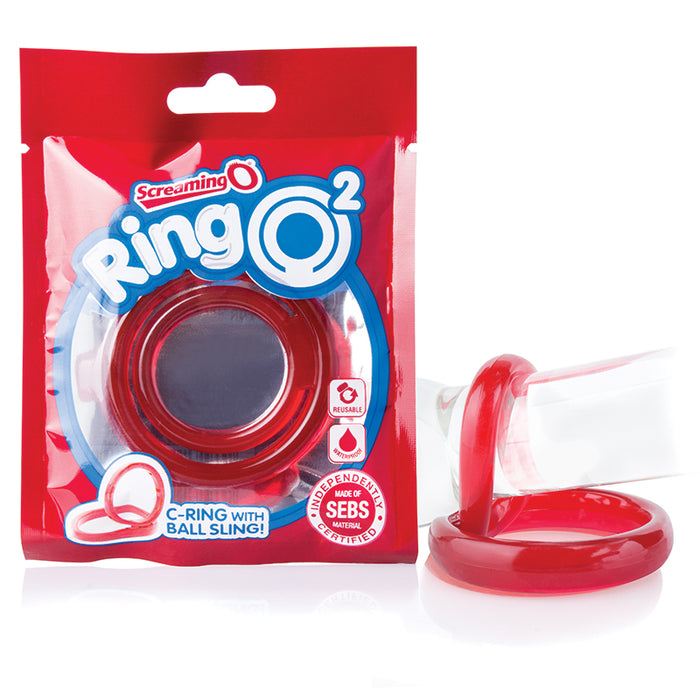 red jelly cock ring with ball sling next to screaming o package