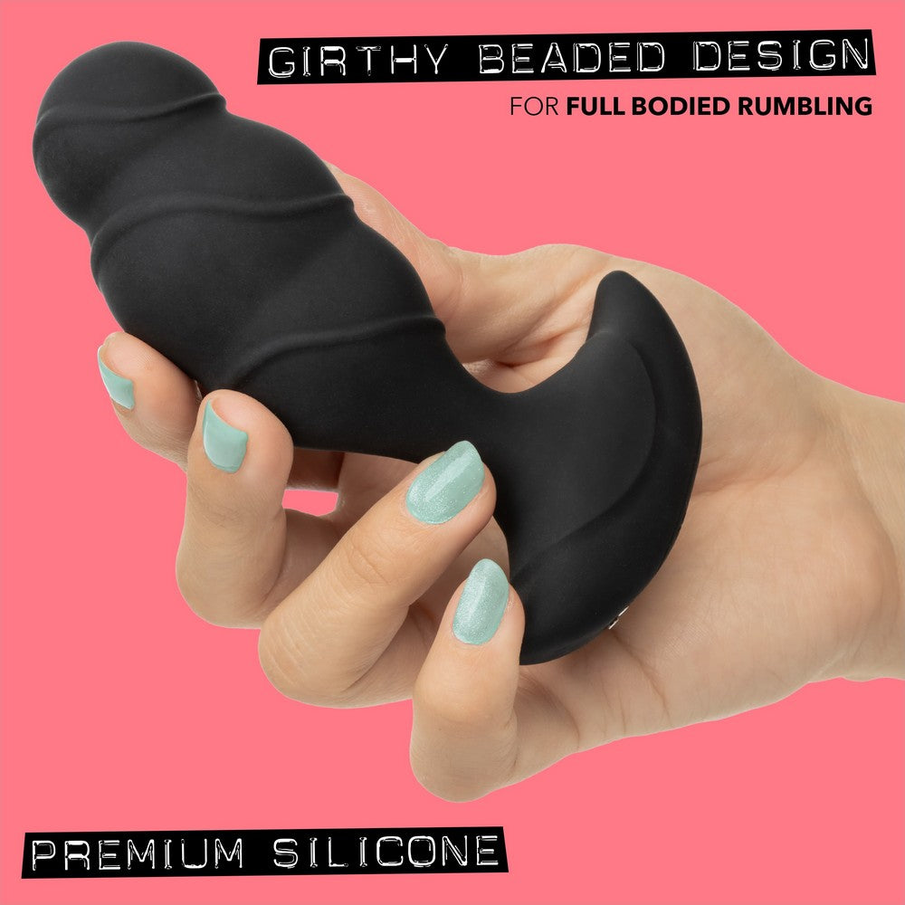 black anal plug held in hand