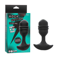 Black ribbed silicone anal plug shown next to its teal and black retail packaging box on a white background.