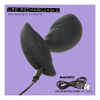 Black USB rechargeable anal probe with magnetic contacts on a purple background