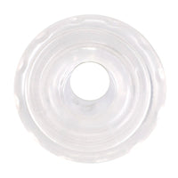 Clear silicone cock ring on a white background