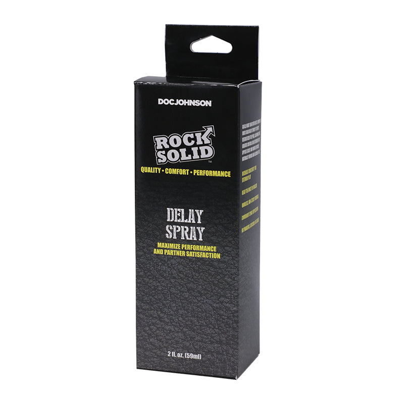 black and grey box with rock solid delay spray inside