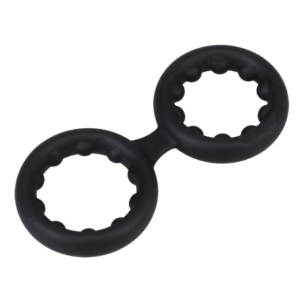 Black double cock ring with metal beads on a white background