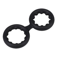 Black double cock ring with metal beads on a white background