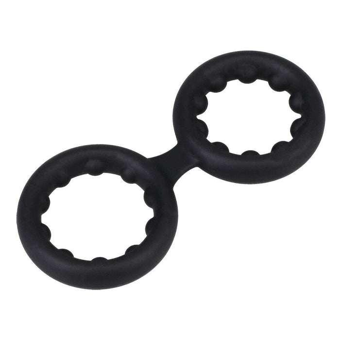 Black double cock ring with metal beads on a white background