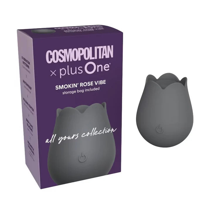 black rose shaped clitoral vibrator, beside purple box packaging, on white back ground 