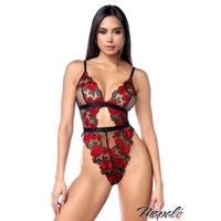Woman wearing a black lingerie set with red floral embroidery on a white background, featuring the brand 'Mapale'.