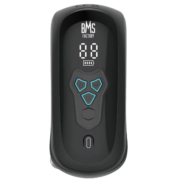 Black electronic masturbator with digital display and buttons on a white background