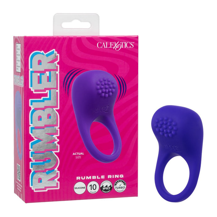 A purple silicone rumbler ring shown next to its pink retail packaging box. The box features the brand name 'CAL EXOTICS' and the product name 'RUMBLER'.