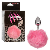 Pink bunny tail with silver anal plug and packaging displaying 'Running Wild' branding.