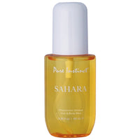 yellow bottle of sahara pheromone hair and body mist with a white lid on a white back ground
