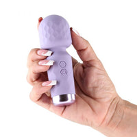 Hand holding a 'Lust N Dreams' salsa vibrator on a white background