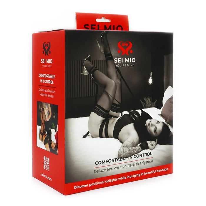 woman laying on bed with neck and feet restraint on box packaging