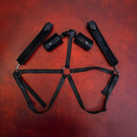 Sei mio body harness body kit featuring straps and buckles.