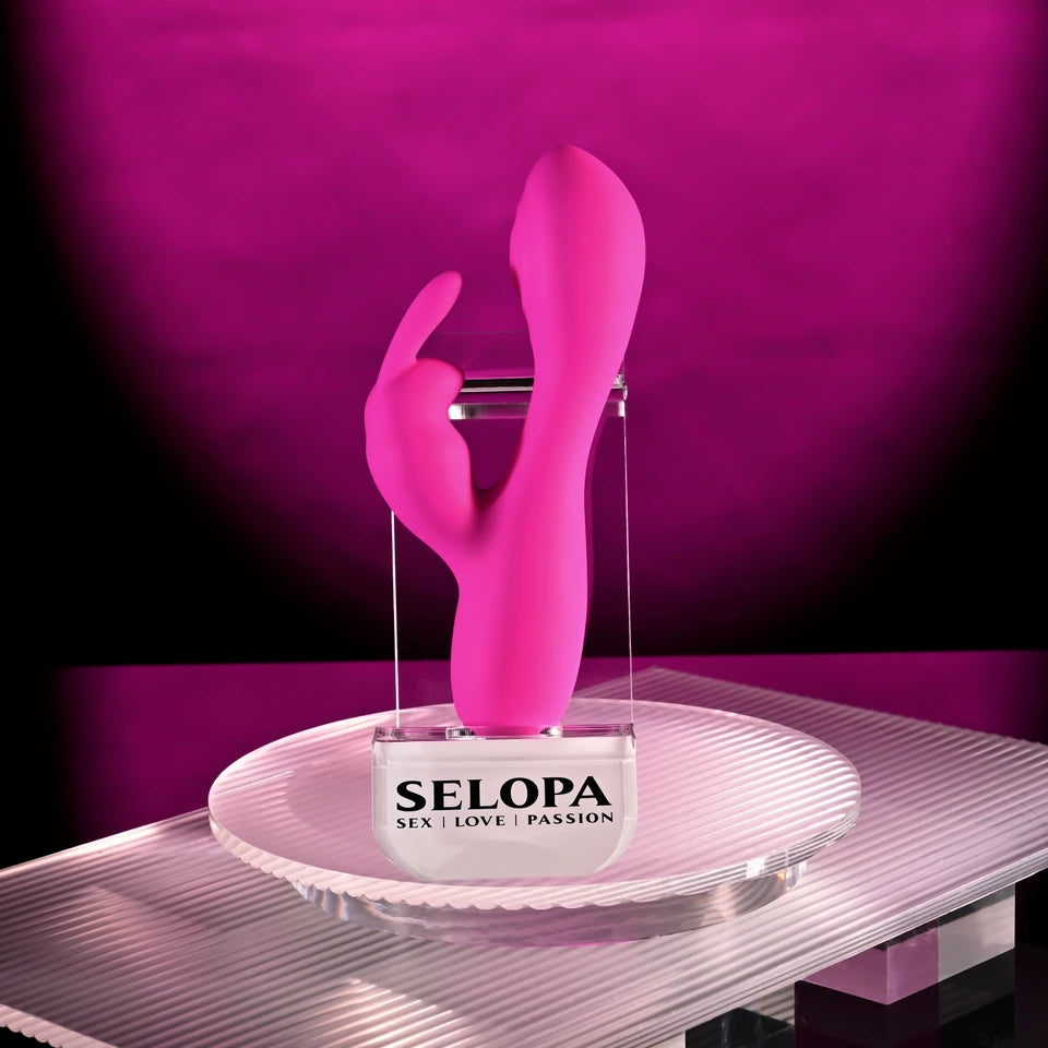 pink vibrator with bunny clitoral stimulator, on stand