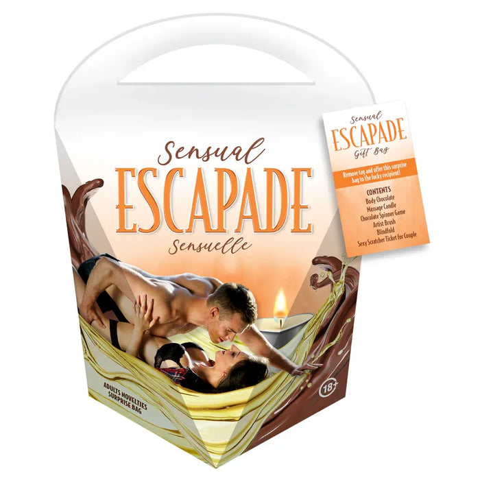 Sensual Escapade gift box with couple in bed and candle on a white background