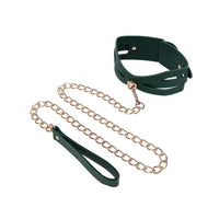 Green leather collar with gold chain leash and handle on a white background