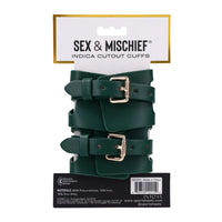 Green leather cuffs with gold buckles on a white background, featuring 'Sex & Mischief' branding.