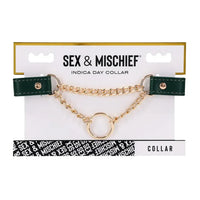Sex & Mischief collar on packaging with green leather and gold chain
