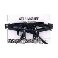 Black laced garters with silver accents on a 'Sex & Mischief' branded card.