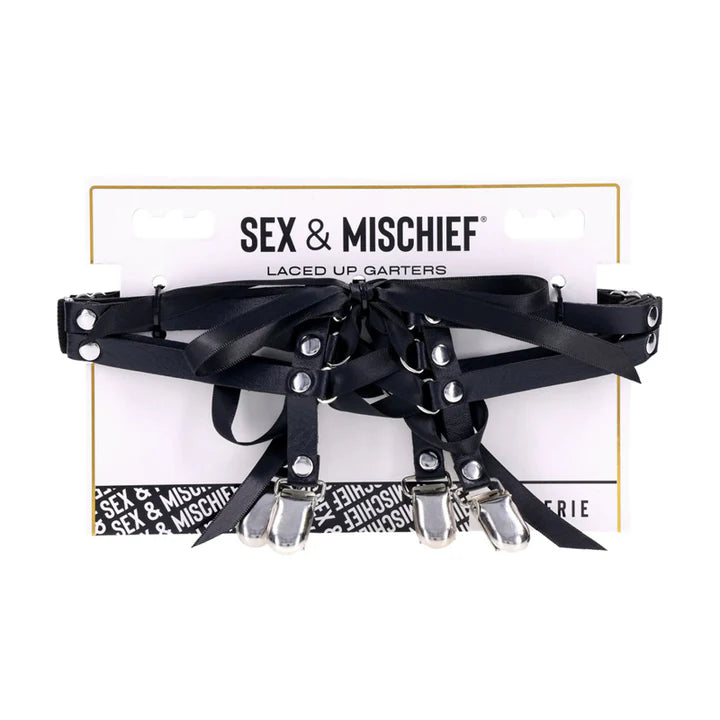 Black laced garters with silver accents on a 'Sex & Mischief' branded card.