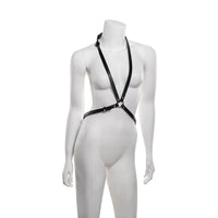 Mannequin wearing a black harness on a white background